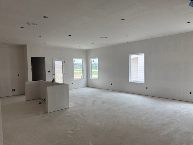 112 Mathew Street Bertram, TX 78605 - Photo 2 of 3 a view of an empty room with a window