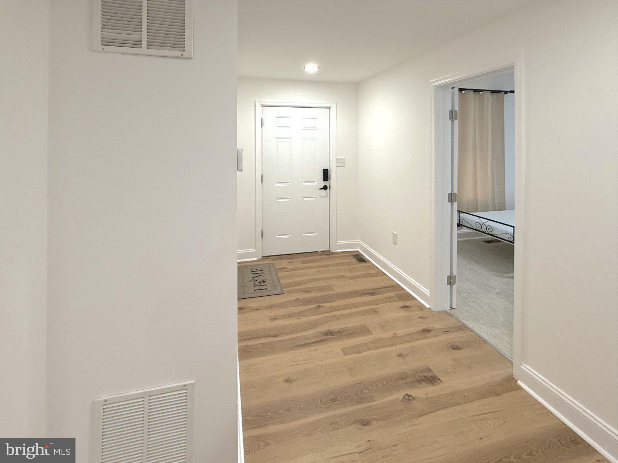 3703 6th Street, Unit 1 Baltimore, MD 21225 - Photo 2 of 12 Inviting entryway with modern charm.