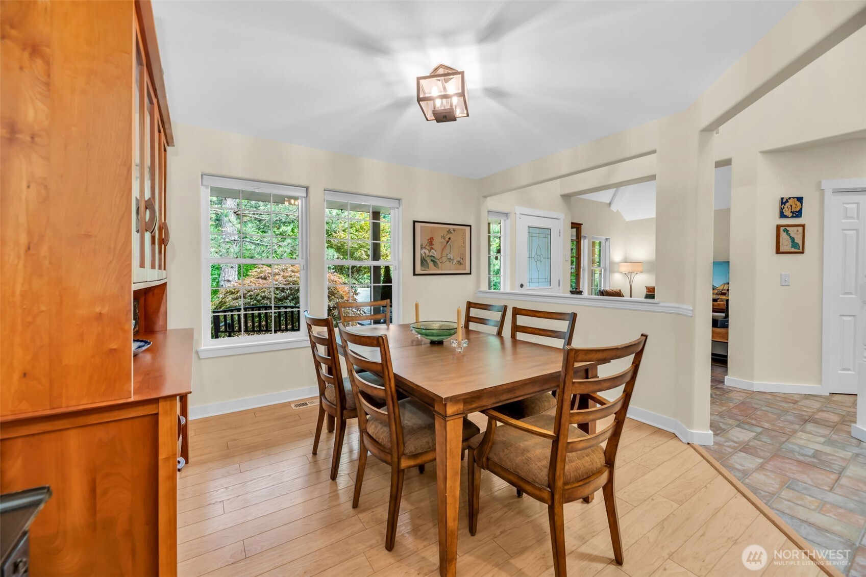 18005 252nd Avenue Southeast Maple Valley, WA 98038 - Photo 13 of 40 a view of a dining room with furniture and a window