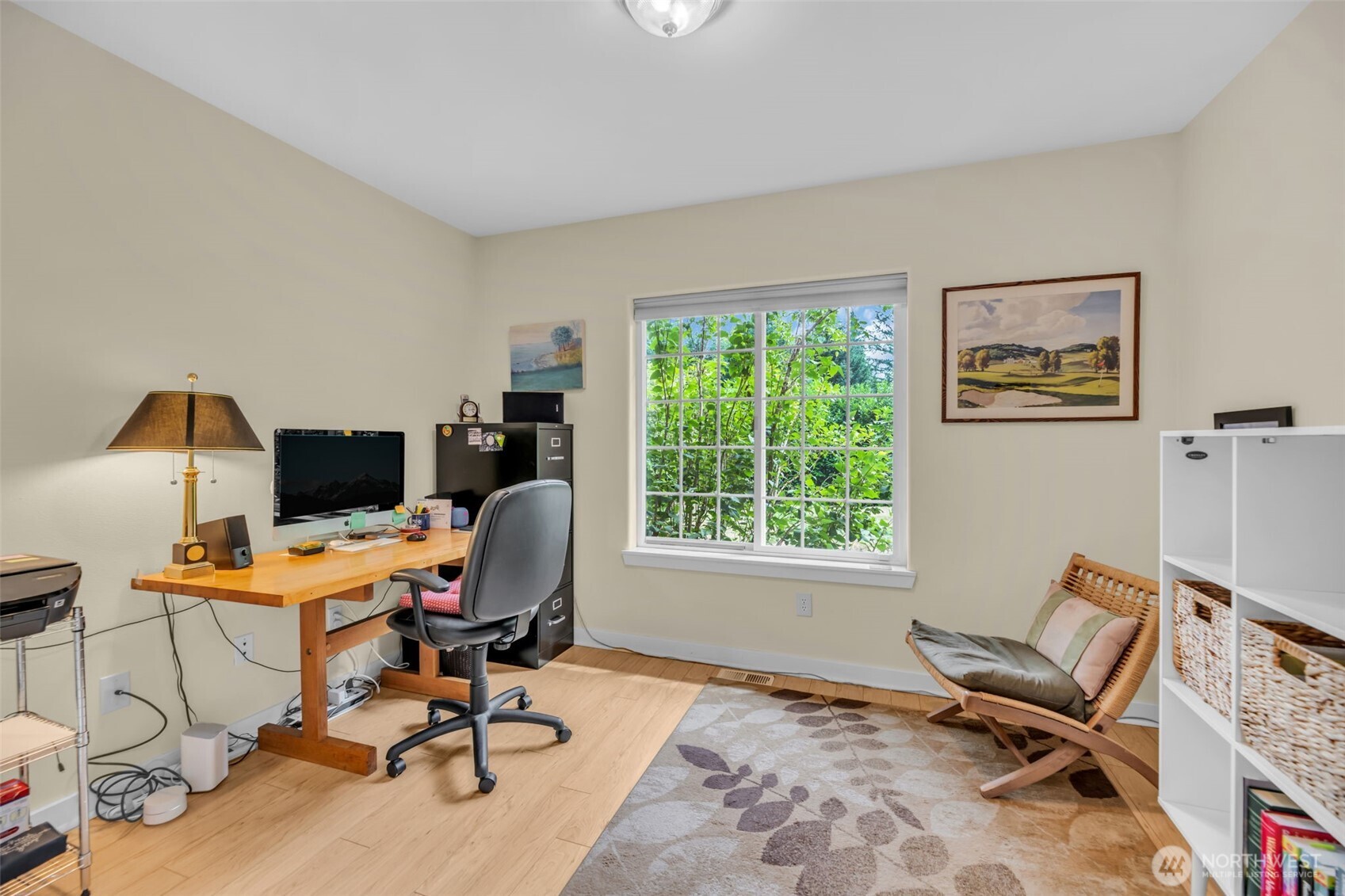 18005 252nd Avenue Southeast Maple Valley, WA 98038 - Photo 14 of 40 a view of a workspace with furniture and a window