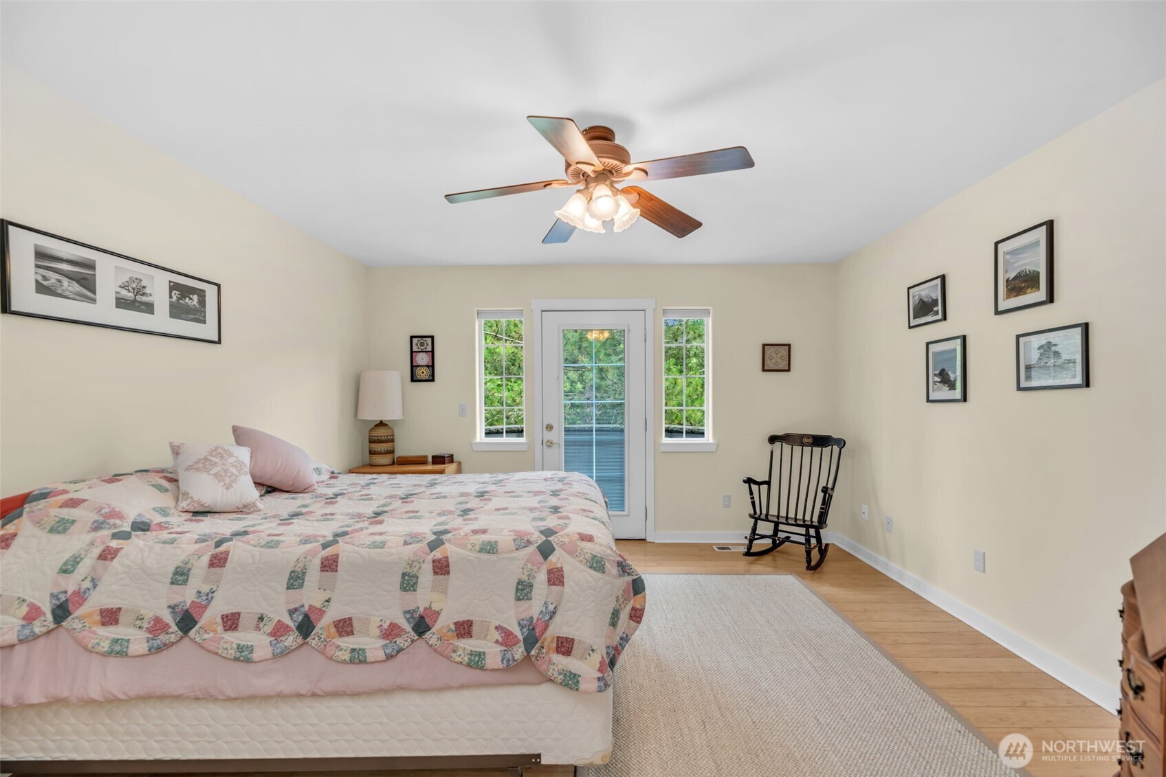 18005 252nd Avenue Southeast Maple Valley, WA 98038 - Photo 23 of 40 a bedroom with a bed and a chair