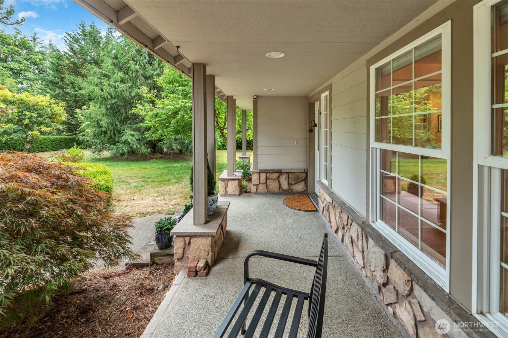 18005 252nd Avenue Southeast Maple Valley, WA 98038 - Photo 37 of 40 a view of an outdoor space with seating area