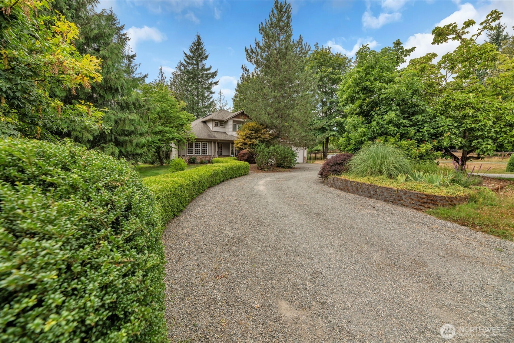 18005 252nd Avenue Southeast Maple Valley, WA 98038 - Photo 38 of 40 front view of a house with a yard