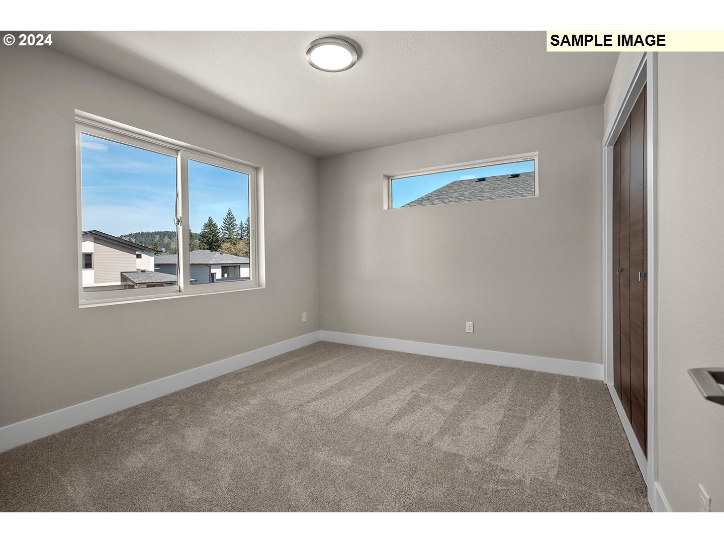 12343 Southeast Falling Rain Way Happy Valley, OR 97086 - Photo 29 of 39 a view of an empty room with a window