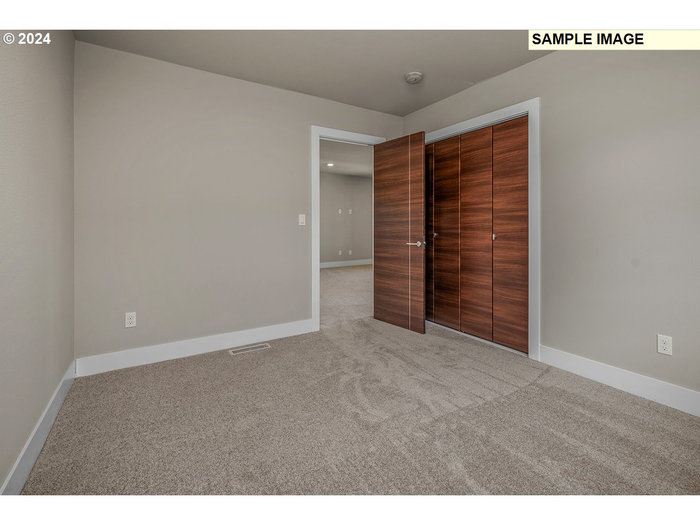12343 Southeast Falling Rain Way Happy Valley, OR 97086 - Photo 31 of 39 a view of an empty room with walk in closet
