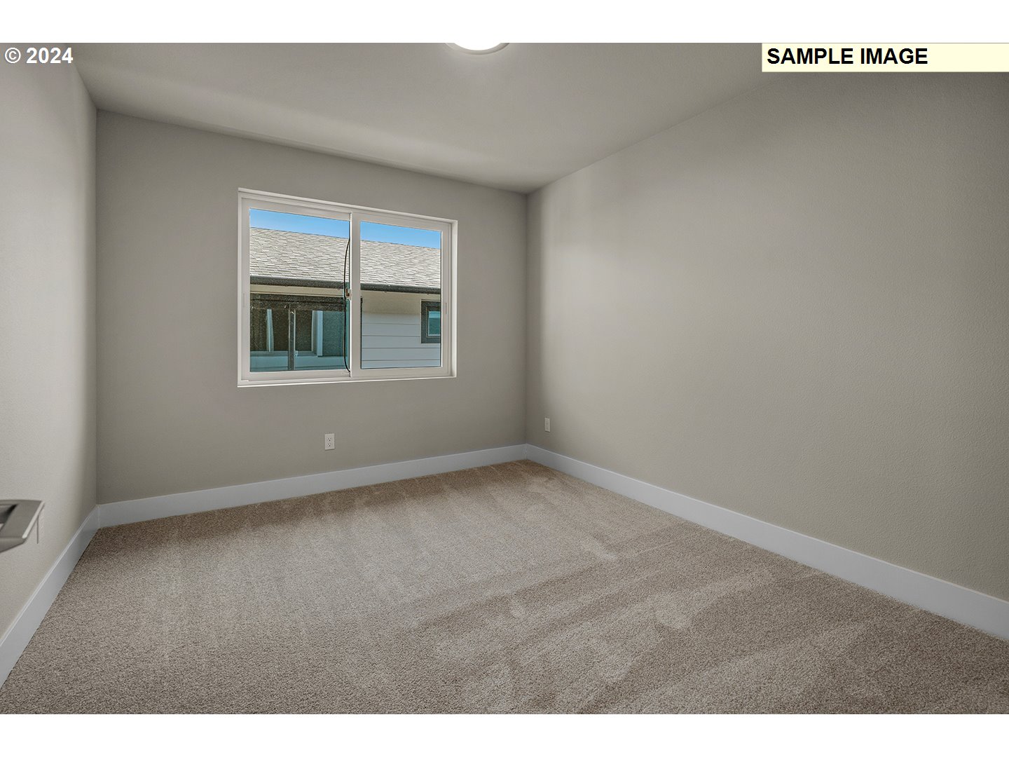 12343 Southeast Falling Rain Way Happy Valley, OR 97086 - Photo 32 of 39 a view of an empty room with a window