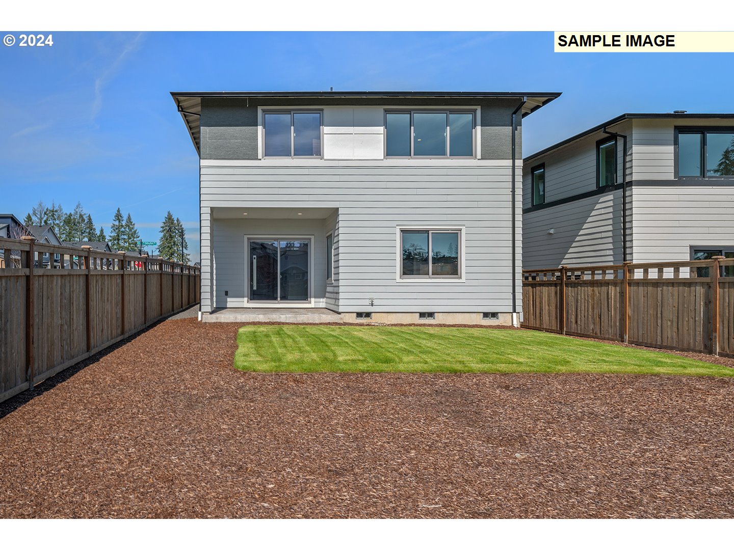 12343 Southeast Falling Rain Way Happy Valley, OR 97086 - Photo 38 of 39 a house view with a backyard space