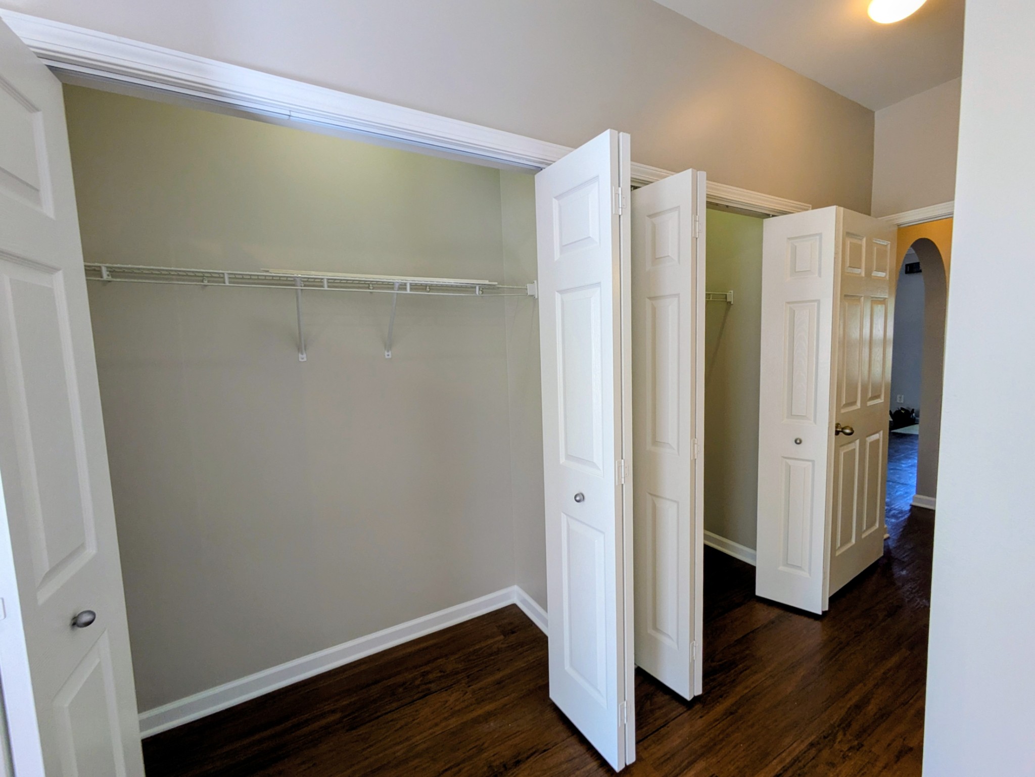1101 Downs Boulevard, Unit 267 Franklin, TN 37064 - Photo 12 of 36 a view of walk in closet with wooden floor
