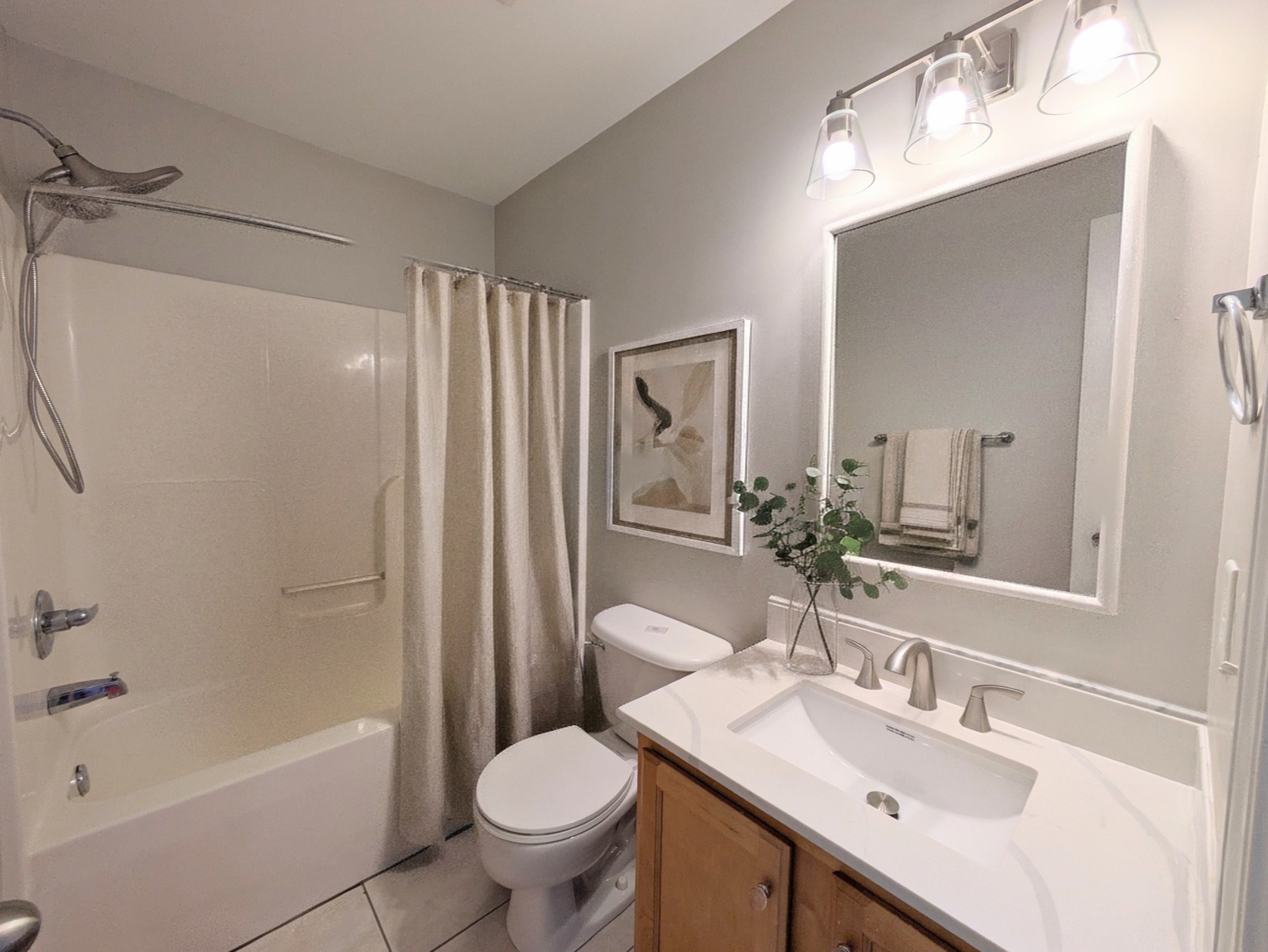 1101 Downs Boulevard, Unit 267 Franklin, TN 37064 - Photo 15 of 36 a bathroom with a sink toilet and shower