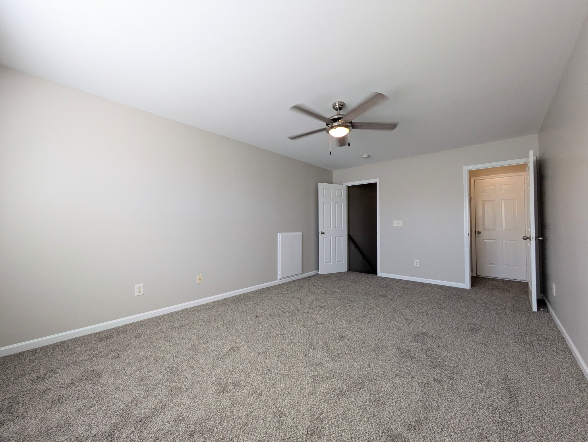 1101 Downs Boulevard, Unit 267 Franklin, TN 37064 - Photo 21 of 36 a view of an empty room with a chandelier fan