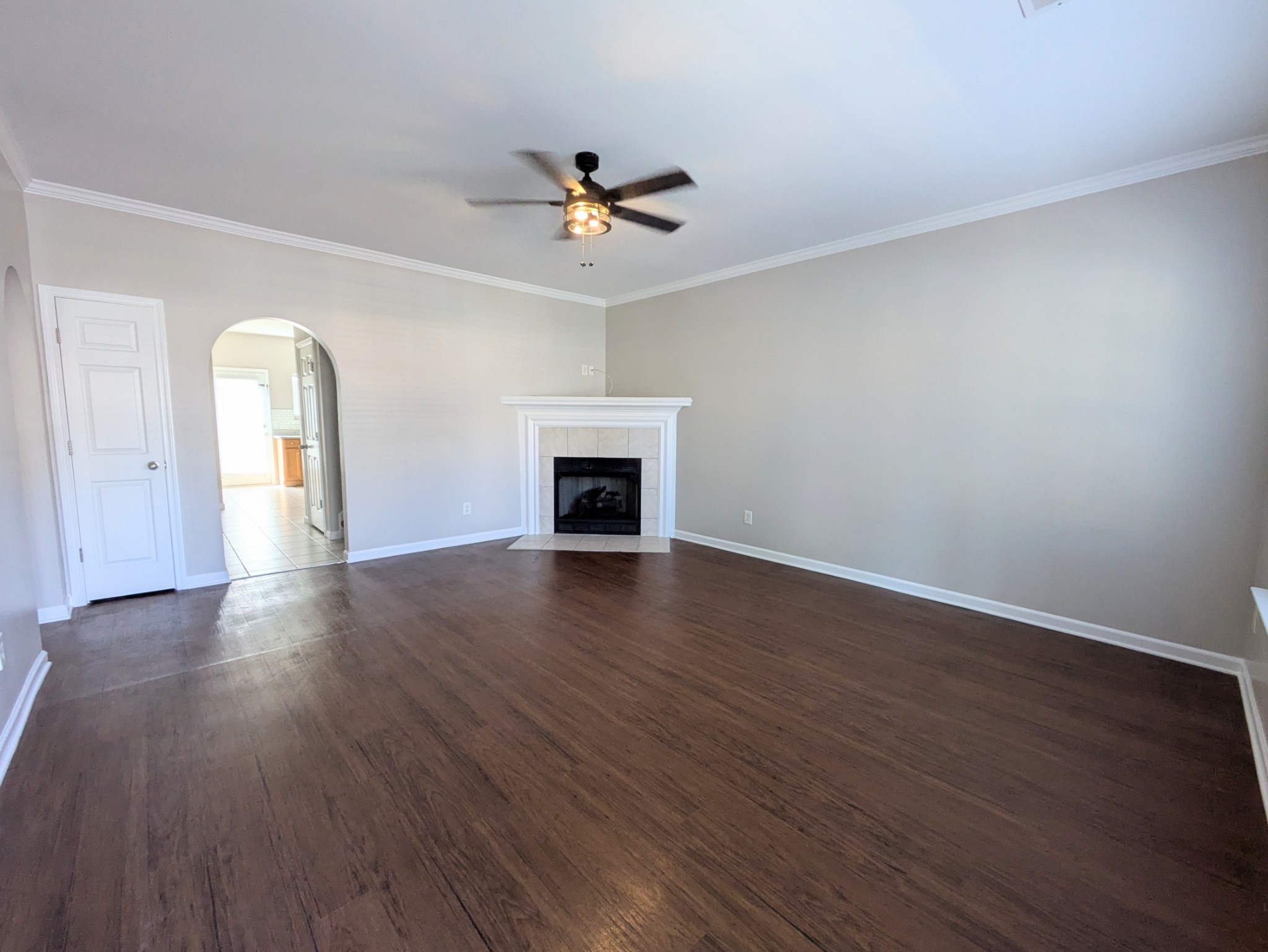 1101 Downs Boulevard, Unit 267 Franklin, TN 37064 - Photo 6 of 36 wooden floor in an empty room with a window