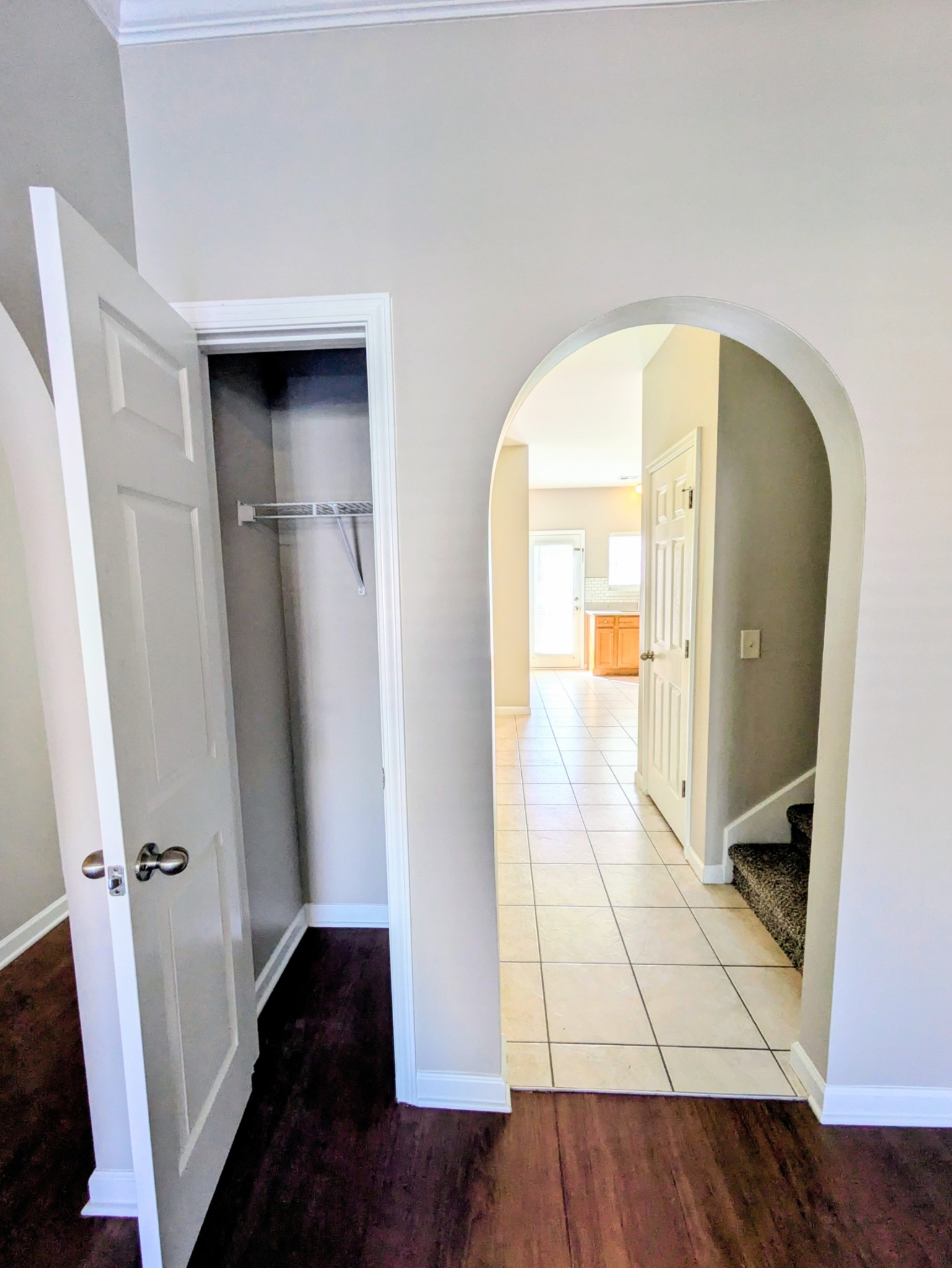 1101 Downs Boulevard, Unit 267 Franklin, TN 37064 - Photo 7 of 36 a view of a hallway view with wooden floor and living room