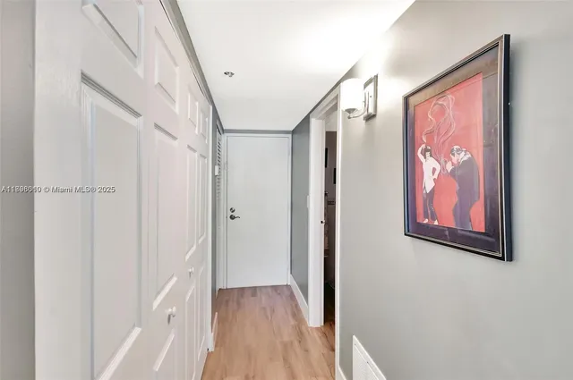 a bathroom with a sink a mirror and a toilet