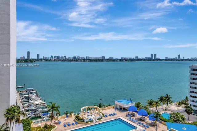 a view of a swimming pool with a terrace