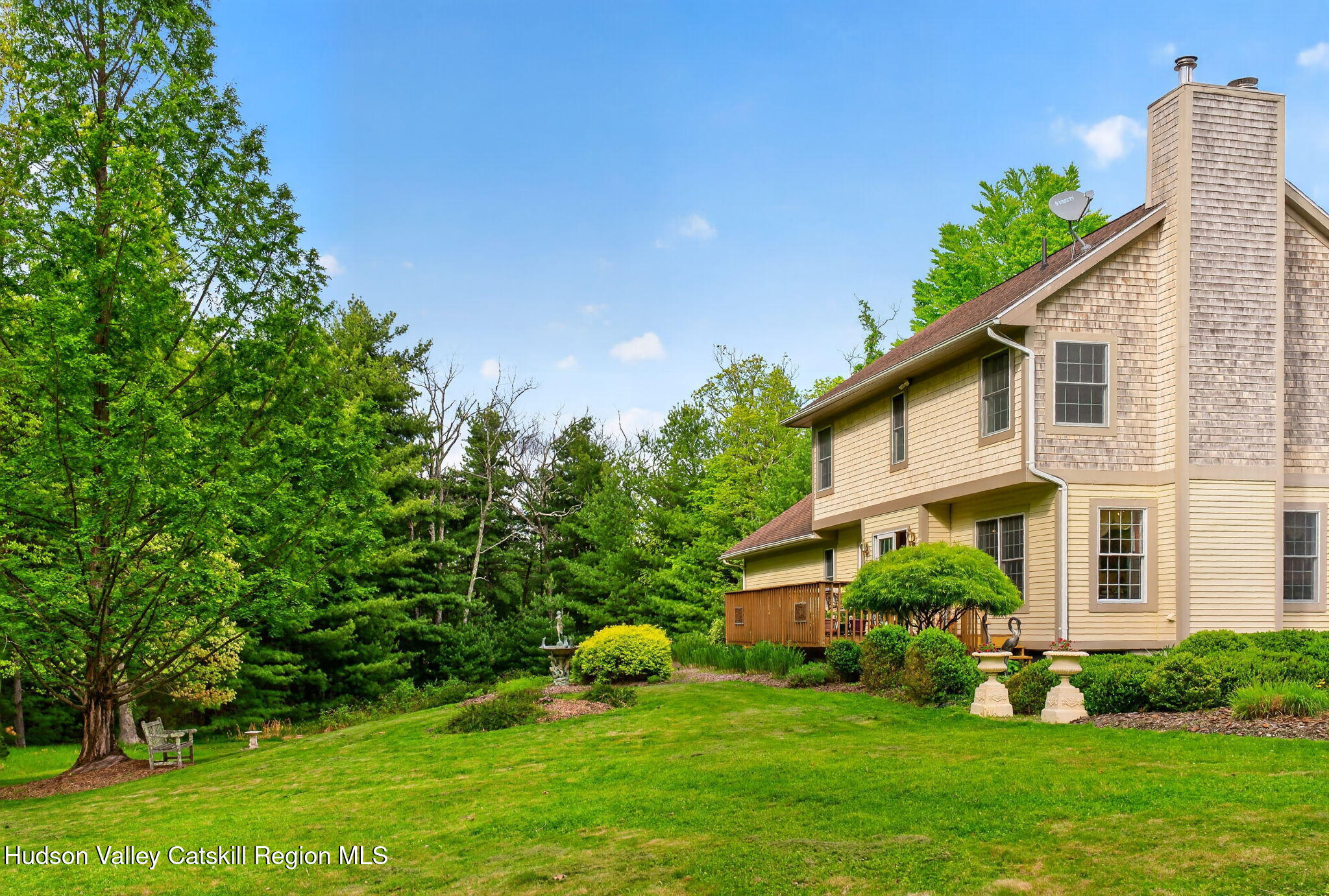 189 Bush Road Stone Ridge, NY 12484 - Photo 37 of 60 a view of a house with a yard