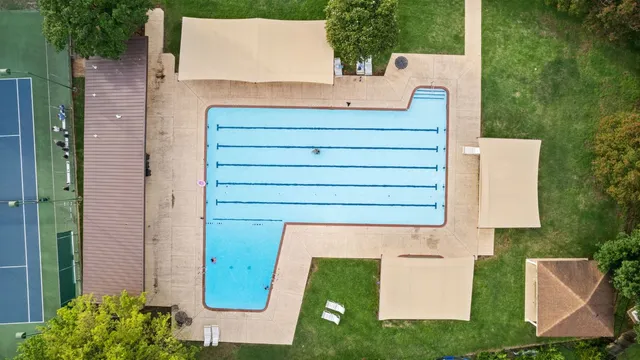 an aerial view of a house with a garden