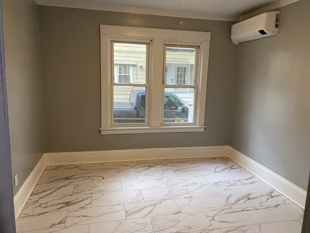 a view of a room with a window