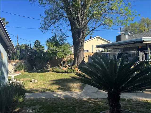 a view of a patio with swimming pool