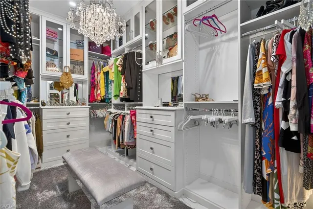 a dining room with table and hallway
