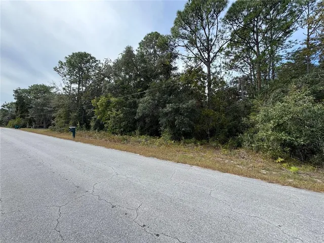 a view of outdoor space and yard