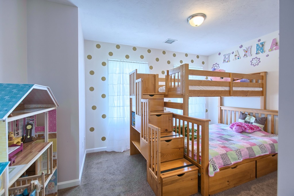 4 Gary Road Templeton, MA 01468 - Photo 21 of 30 a bedroom with furniture and a baby crib
