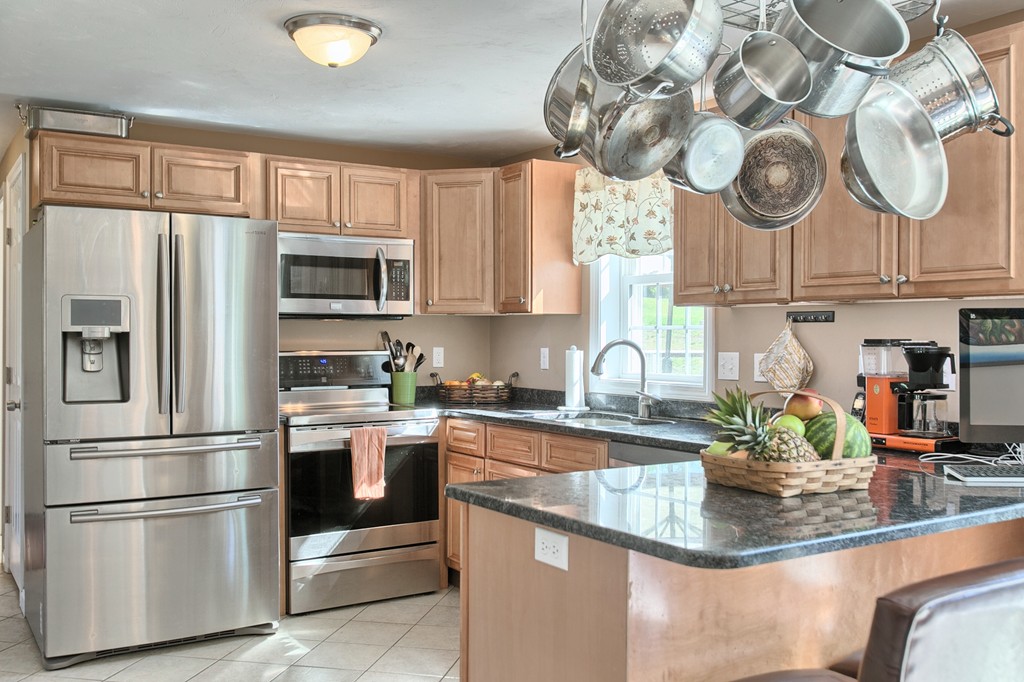 4 Gary Road Templeton, MA 01468 - Photo 5 of 30 a kitchen with stainless steel appliances granite countertop a refrigerator and a sink
