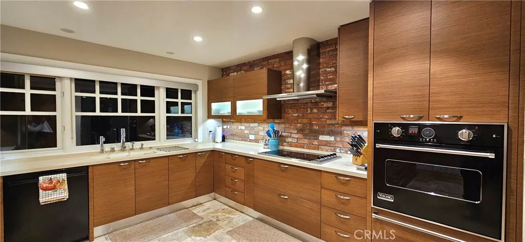 33925 Cape Cove Dana Point, CA 92629 - Photo 15 of 50 a kitchen with a stove and a sink