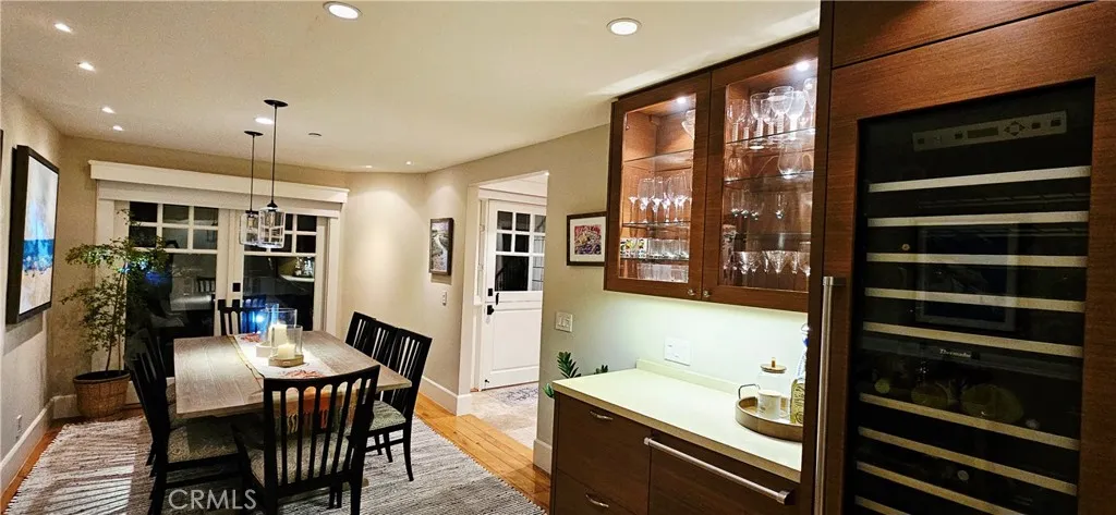 33925 Cape Cove Dana Point, CA 92629 - Photo 19 of 50 a kitchen with a table chairs sink and refrigerator