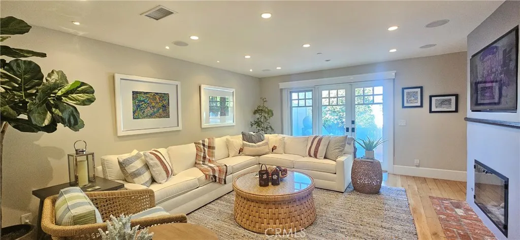 33925 Cape Cove Dana Point, CA 92629 - Photo 2 of 50 a living room with furniture and a couch