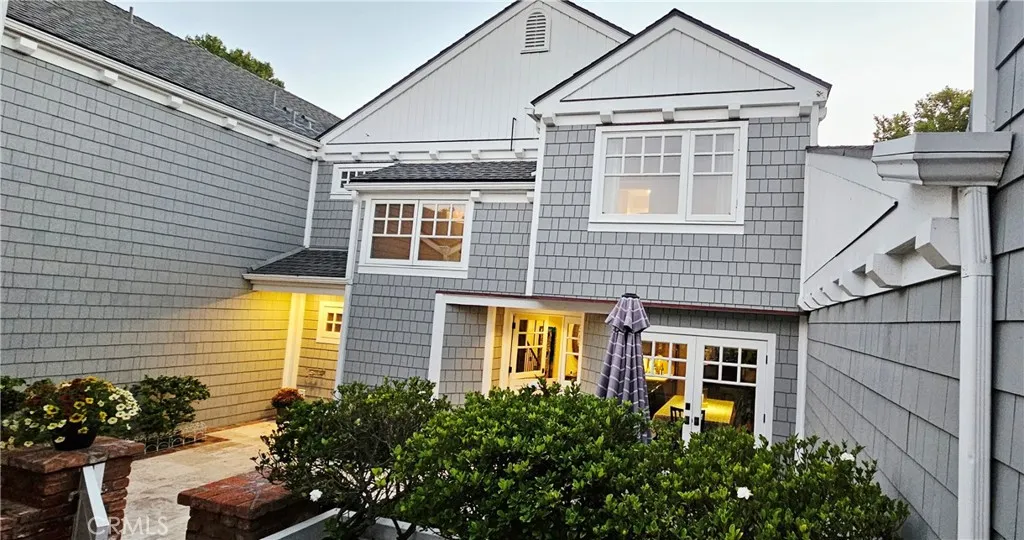 33925 Cape Cove Dana Point, CA 92629 - Photo 42 of 50 a view of a house with brick walls and potted plants
