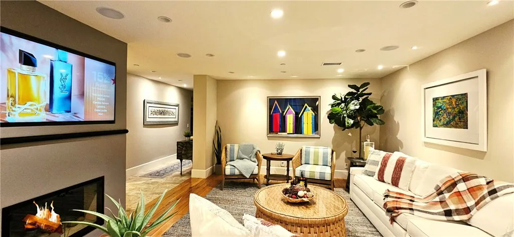 33925 Cape Cove Dana Point, CA 92629 - Photo 7 of 50 a living room with furniture and a flat screen tv