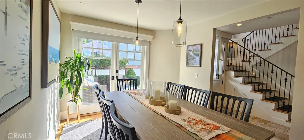 33925 Cape Cove Dana Point, CA 92629 - Photo 8 of 50 a view of a dining room with furniture window and wooden floor