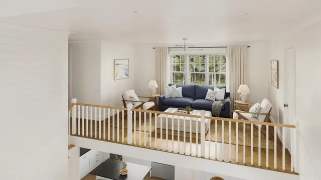 a view of a bedroom with furniture