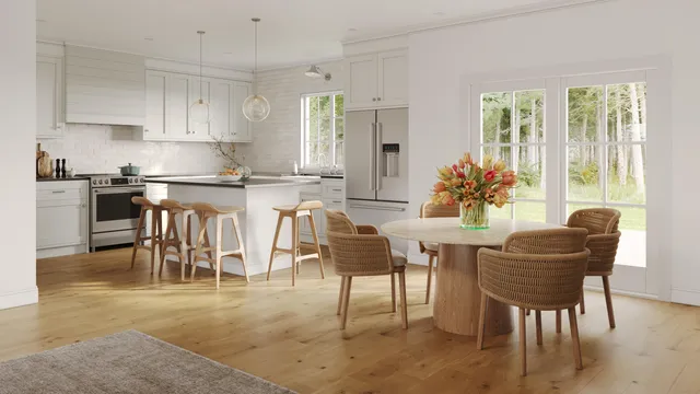 a kitchen with a table chairs stove and refrigerator