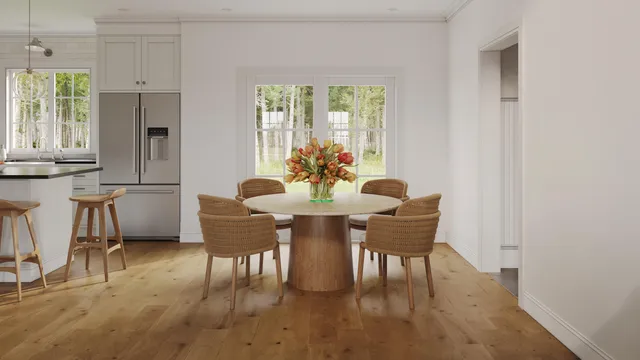a dining room with furniture and window