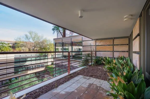 a view of a balcony with a plant