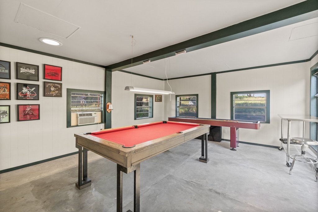 1101 Windy Hills Road Dripping Springs, TX 78620 - Photo 30 of 40 A vibrant game room offers a pool table and ample space for entertainment.