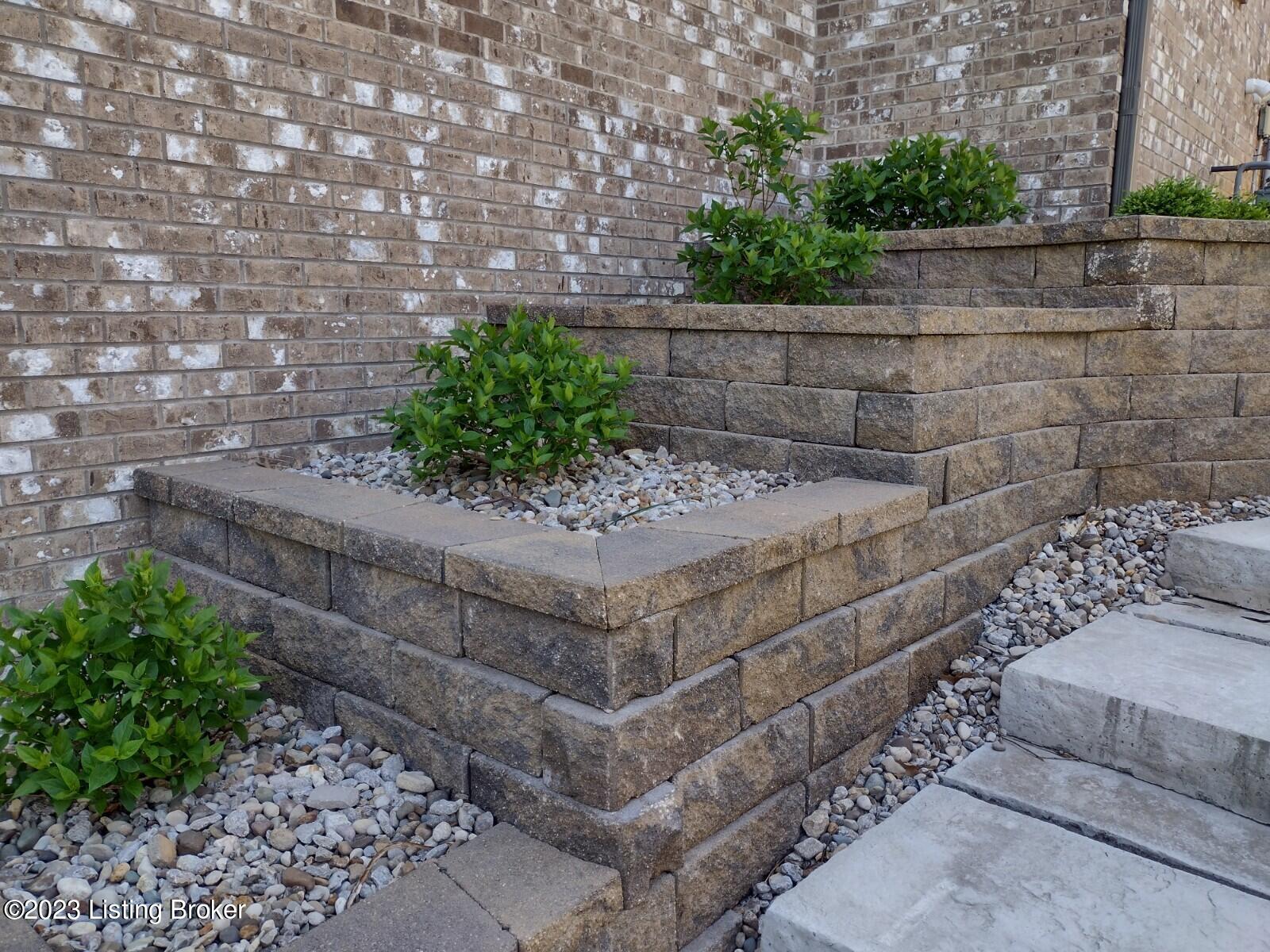 225 Maple Valley Road Louisville, KY 40245 - Photo 64 of 69 custom terraced planters with Limelight hydrangea bushes (bloom in summer)