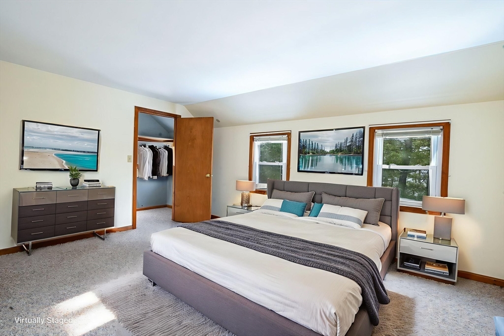 46 Service Road Sandwich, MA 02537 - Photo 20 of 35 a bedroom with a large bed and a window