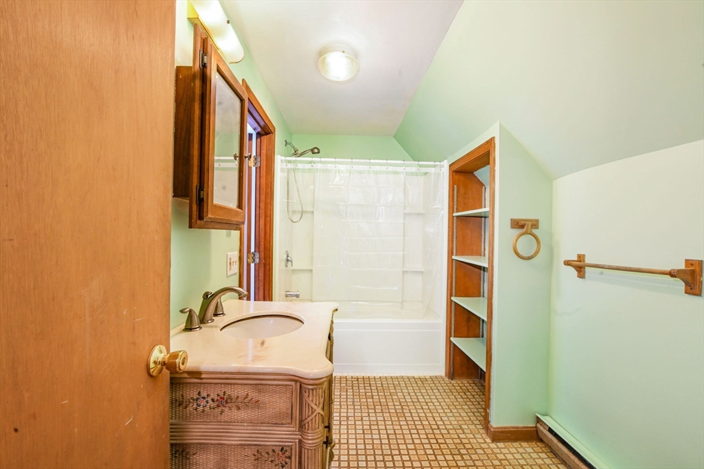 46 Service Road Sandwich, MA 02537 - Photo 23 of 35 a bathroom with a sink a mirror and a shower