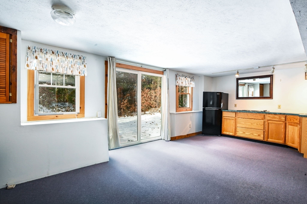 46 Service Road Sandwich, MA 02537 - Photo 24 of 35 a view of an empty room with a window
