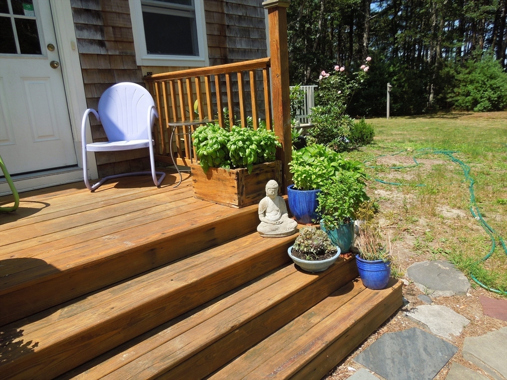 46 Service Road Sandwich, MA 02537 - Photo 29 of 35 a view of a two chairs in the patio
