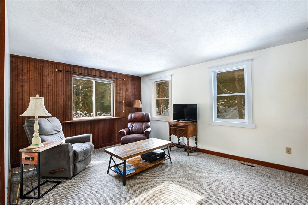 46 Service Road Sandwich, MA 02537 - Photo 9 of 35 a living room with furniture and a window
