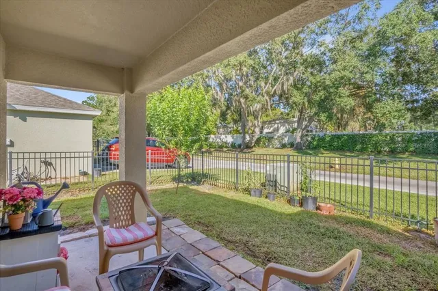 a garden view with a seating space