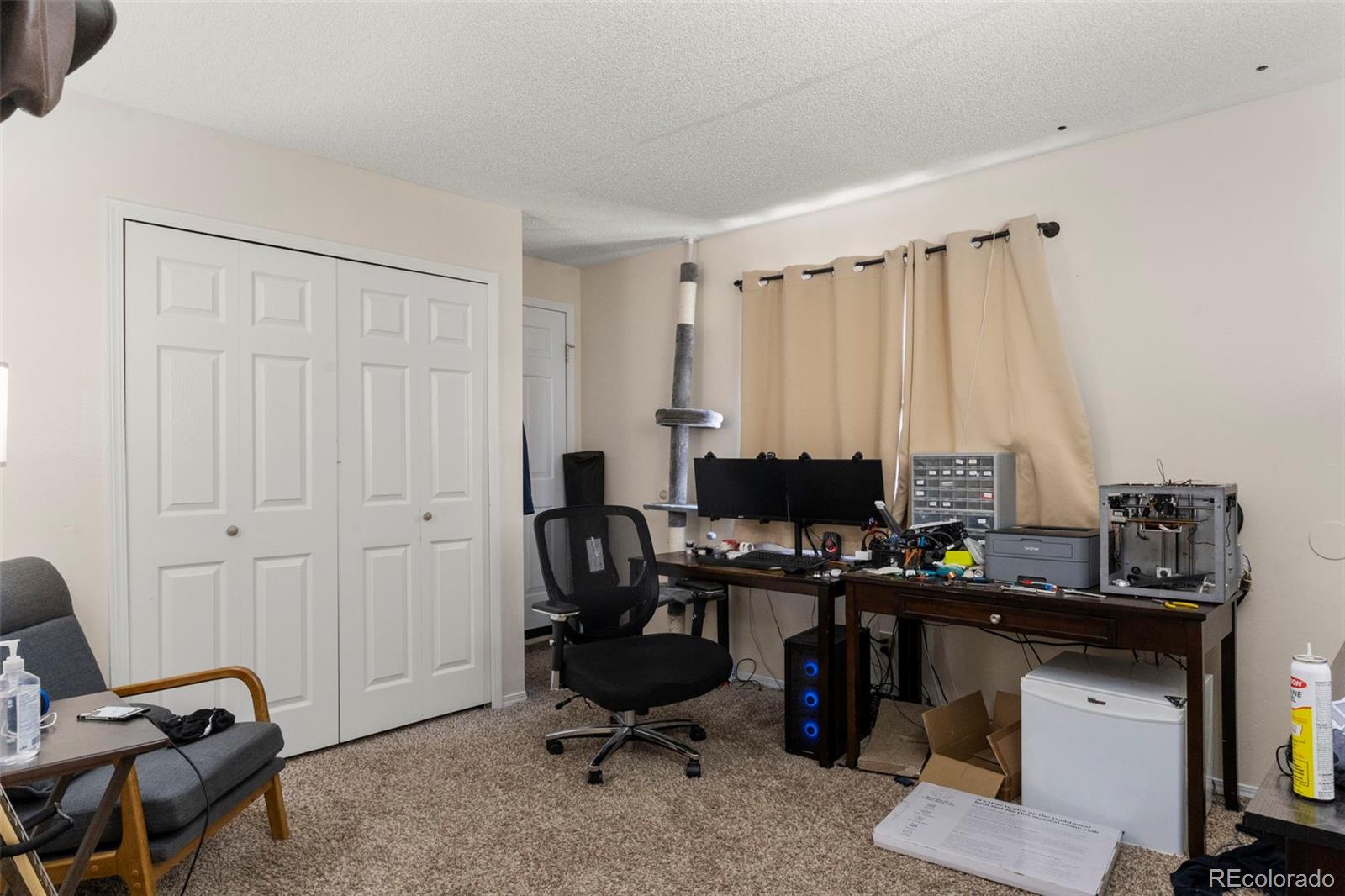 567-579 Winnie Way Colorado Springs, CO 80904 - Photo 14 of 32 a view of a workspace with furniture