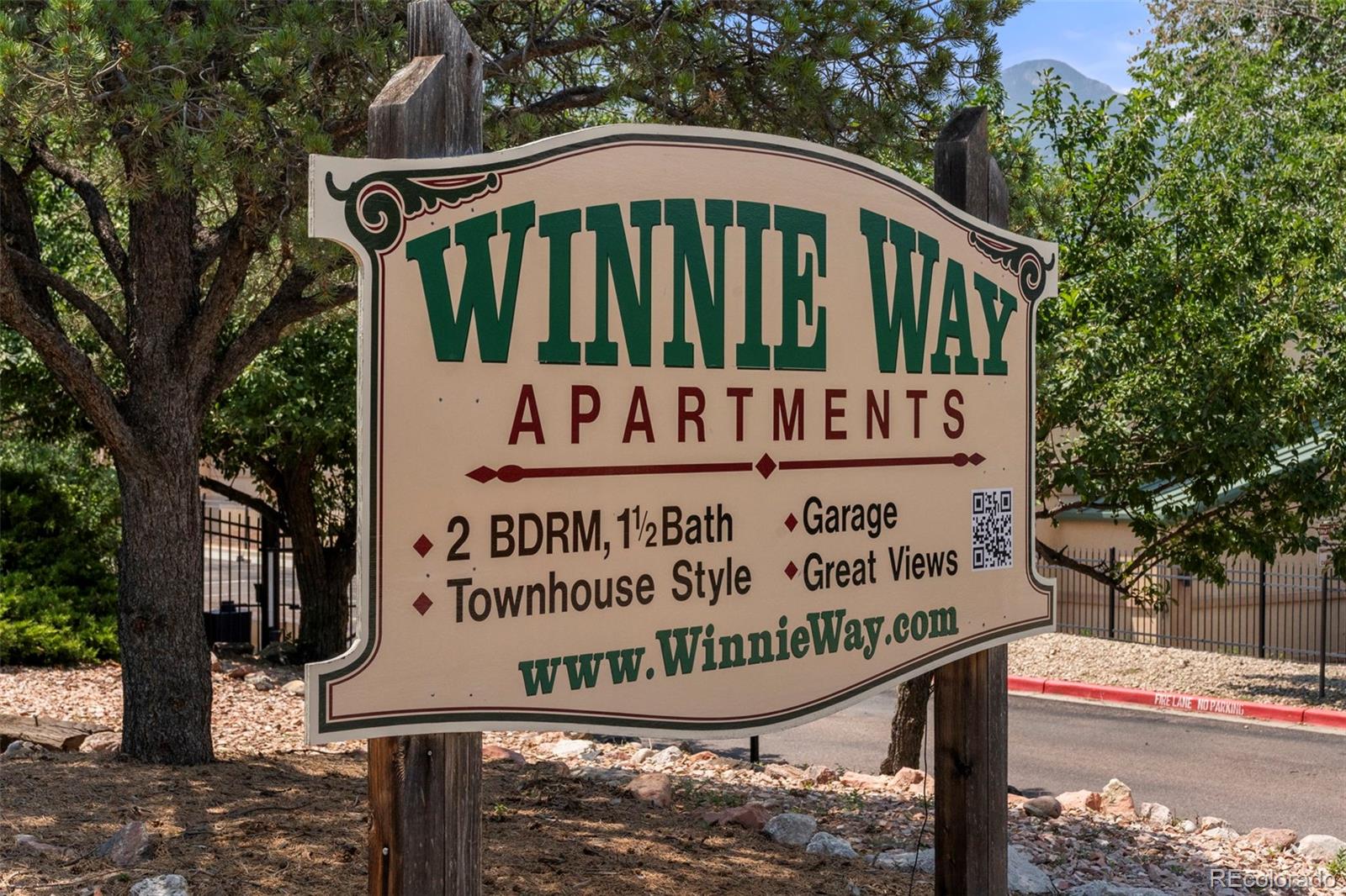 567-579 Winnie Way Colorado Springs, CO 80904 - Photo 2 of 32 a view of a sign board with a street sign