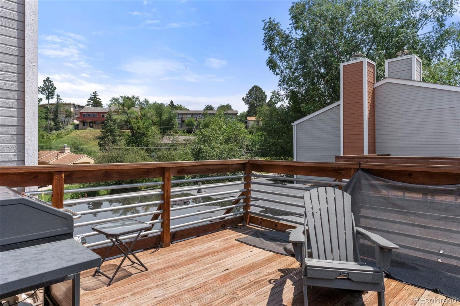 567-579 Winnie Way Colorado Springs, CO 80904 - Photo 23 of 32 a view of a balcony with chairs