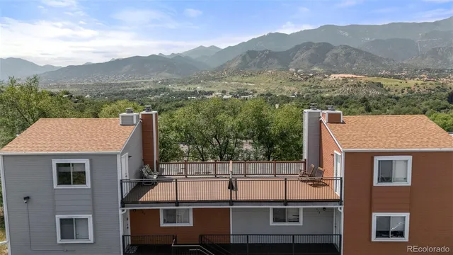 a view of a house with mountain view