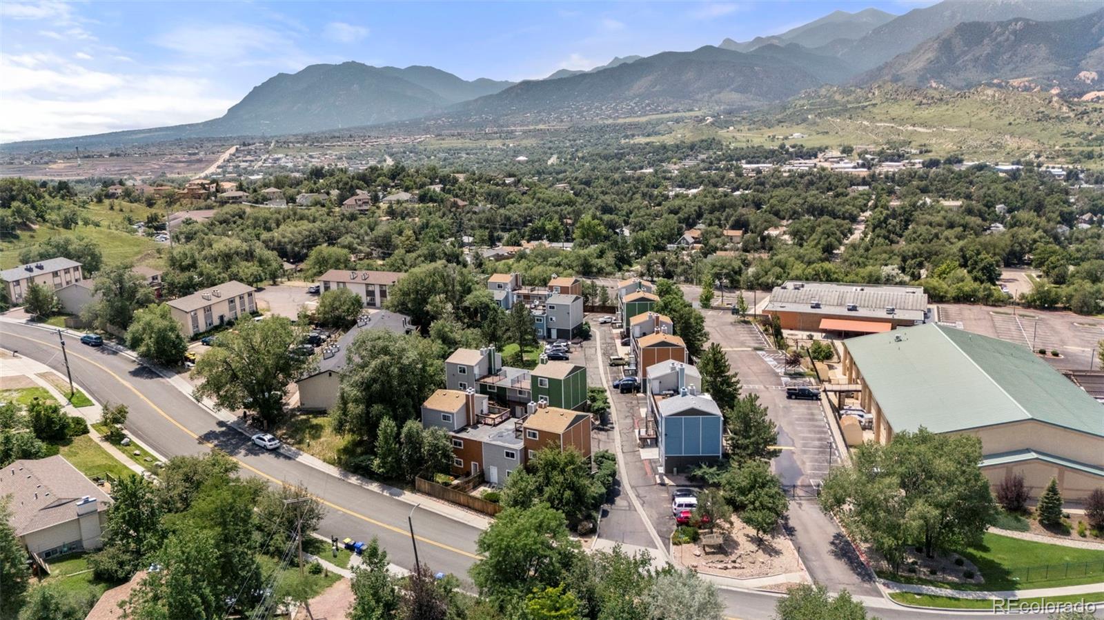 567-579 Winnie Way Colorado Springs, CO 80904 - Photo 27 of 32 an aerial view of residential houses with outdoor space