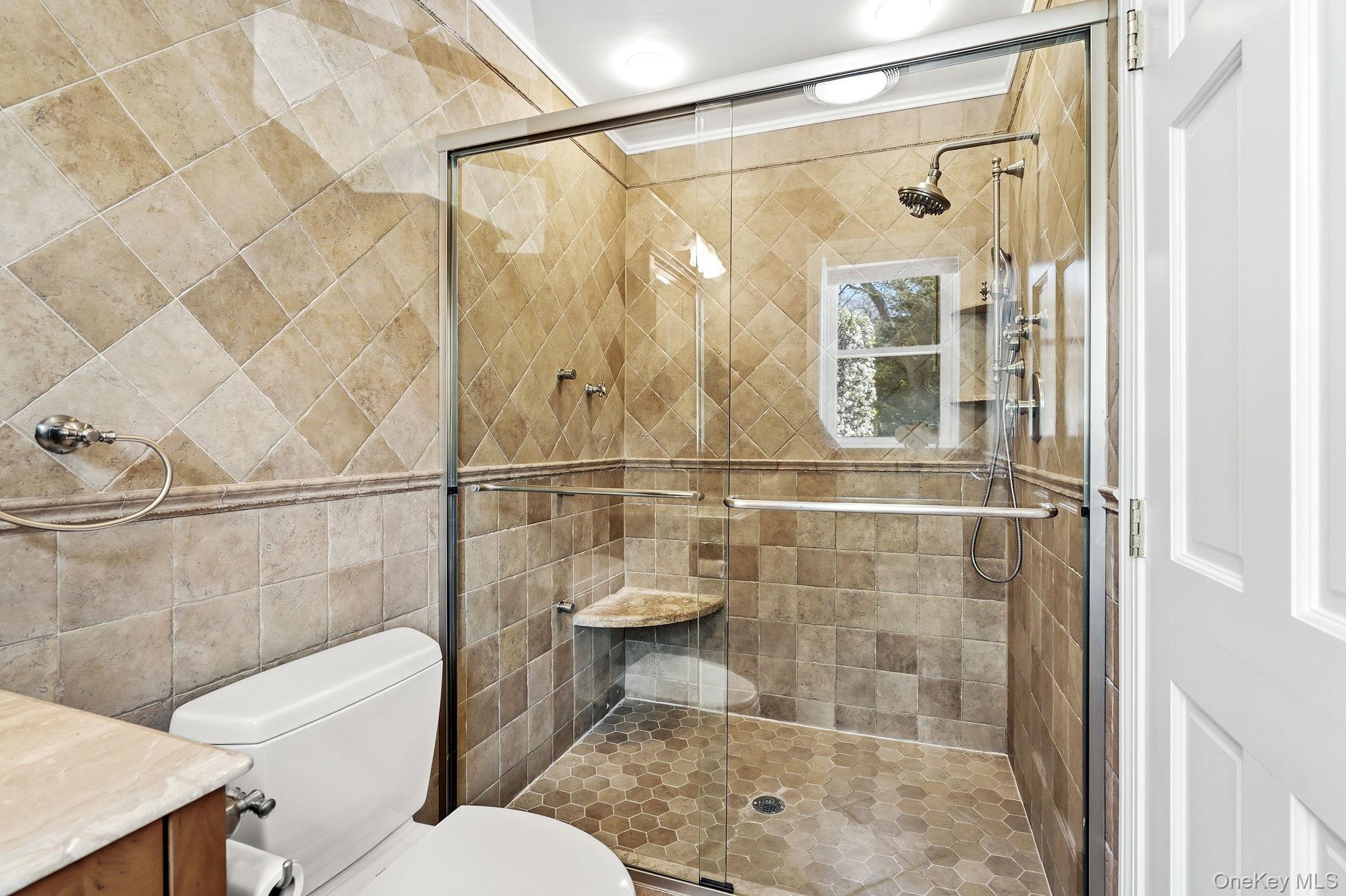 317 Hornidge Road Mamaroneck, NY 10543 - Photo 14 of 21 a bathroom with a toilet and shower